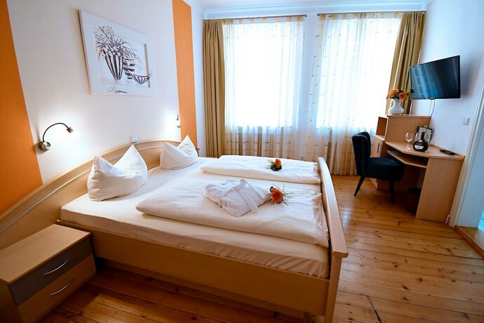 Imagen de la habitación del Gasthof Gr&uuml;ner Baum, Mainsondheim. Foto 19