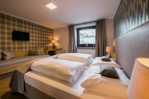 Imagen de la habitación del Gasthof Hotel Hauslwirt. Foto 12
