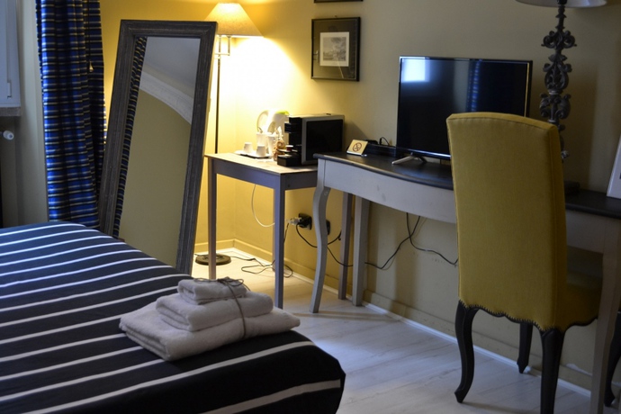 Imagen de la habitación del Gatto Bianco Casa Dei Venti. Foto 10