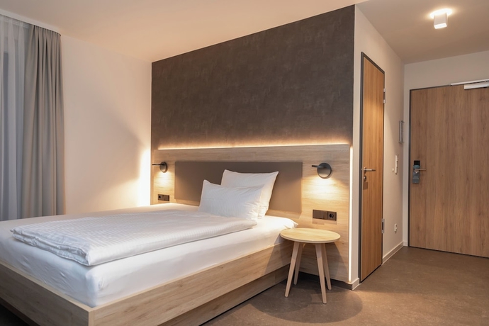 Imagen de la habitación del G&auml;stehaus Bauer. Foto 15