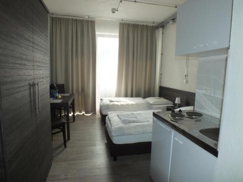 Imagen de la habitación del G&auml;stehaus Ha&szlig;loch/Pfalz. Foto 7