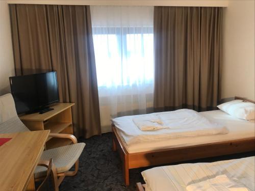 Imagen de la habitación del G&auml;stehaus Ha&szlig;loch/Pfalz. Foto 8