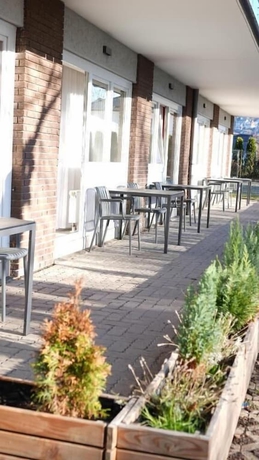 Imagen del bar/restaurante del G&auml;stehaus Tilly Hotel. Foto 3