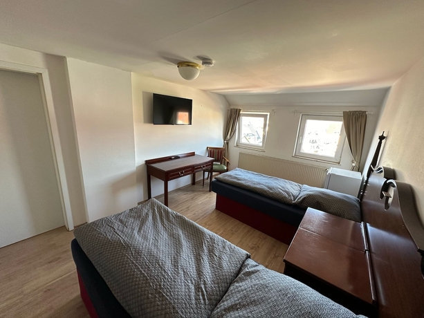 Imagen de la habitación del G&auml;stehaus am Harz - HotelandMonteurzimmer. Foto 7