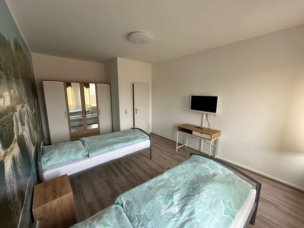 Imagen de la habitación del G&auml;stehaus am Harz - HotelandMonteurzimmer. Foto 11