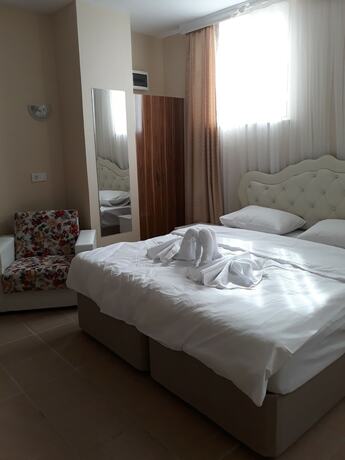 Imagen de la habitación del Gemici Otel. Foto 19