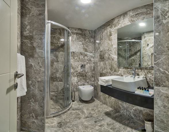 Imagen de la habitación del Gen Suites. Foto 2