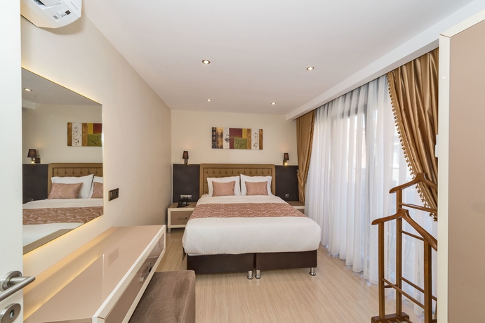 Imagen de la habitación del Gen Suites. Foto 3