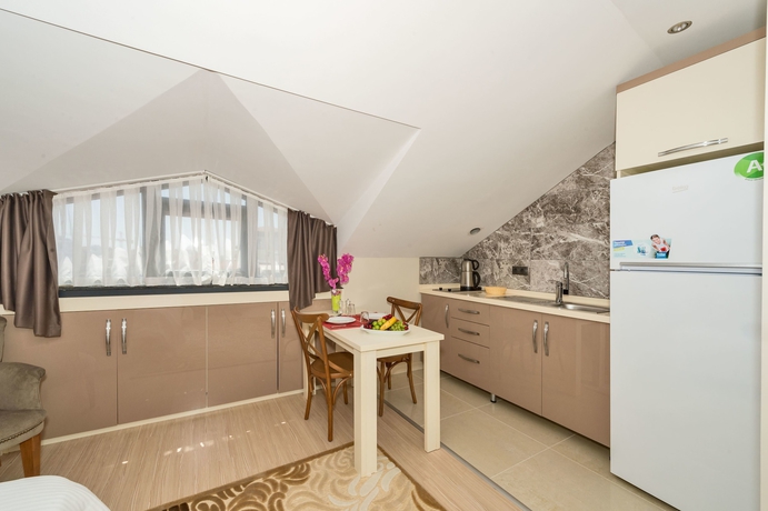 Imagen de la habitación del Gen Suites. Foto 5