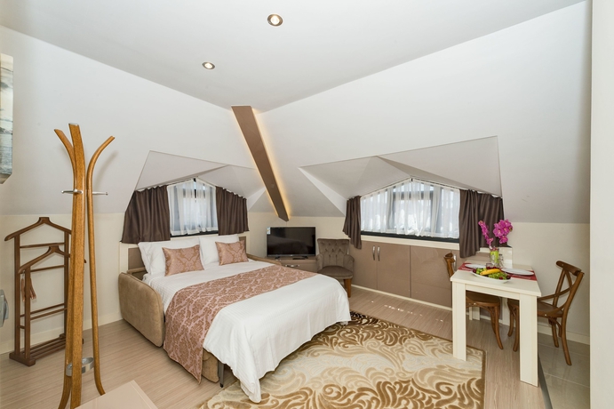 Imagen de la habitación del Gen Suites. Foto 8