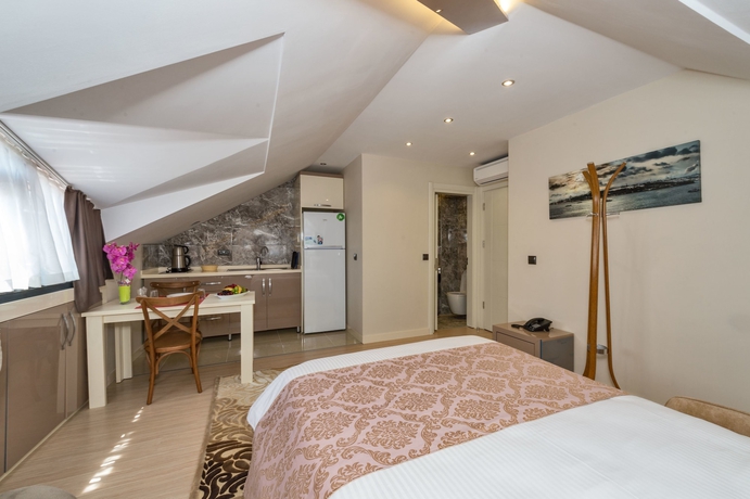 Imagen de la habitación del Gen Suites. Foto 9