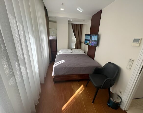 Imagen de la habitación del Genoa Port Hotel. Foto 17