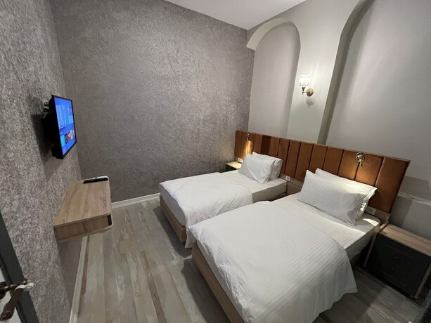 Imagen de la habitación del Genoa Port Hotel. Foto 18
