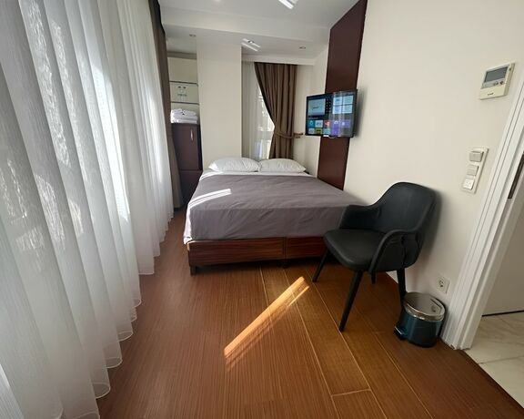 Imagen de la habitación del Genoa Port Hotel. Foto 20