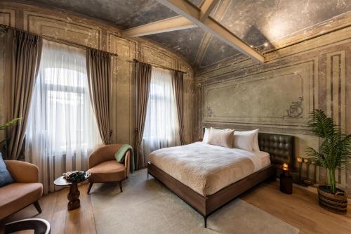 Imagen de la habitación del Genova Suit Hotel. Foto 11