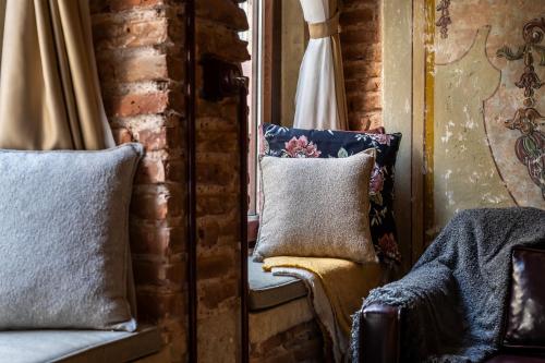 Imagen de la habitación del Genova Suit Hotel. Foto 17