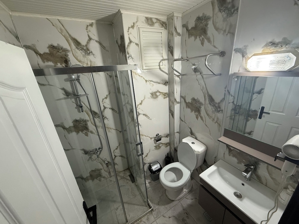 Imagen de la habitación del Germiyan Otel. Foto 14