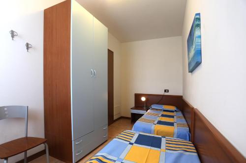 Imagen de la habitación del Ginepri Lido Altanea. Foto 9