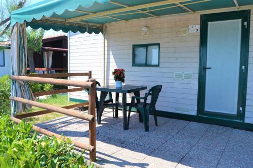 Imagen de la habitación del Girasole Eco Family Village. Foto 9