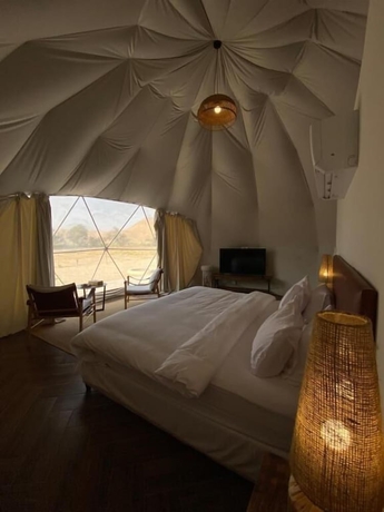 Imagen de la habitación del Glamping Resort. Foto 7
