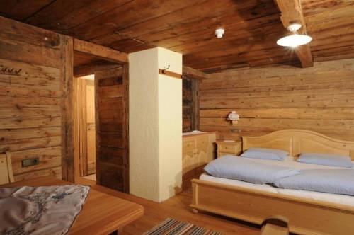 Imagen de la habitación del Glinzhof Mountain Natur Resort Agriturismo. Foto 7