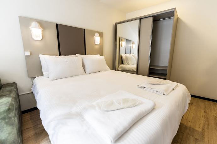 Imagen de la habitación del Global Suites Hotel. Foto 5