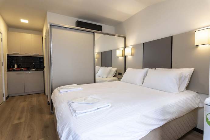 Imagen de la habitación del Global Suites Hotel. Foto 7