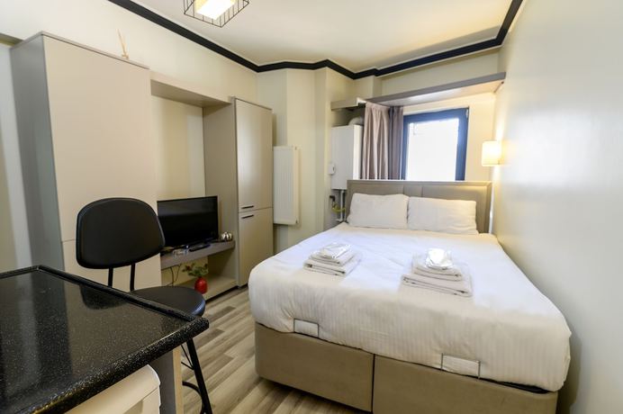 Imagen de la habitación del Global Suites Hotel. Foto 8