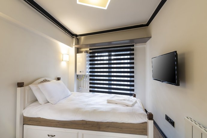 Imagen de la habitación del Global Suites Hotel. Foto 9