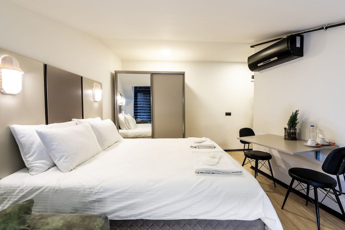 Imagen de la habitación del Global Suites Hotel. Foto 10