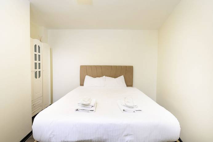 Imagen de la habitación del Global Suites Hotel. Foto 12