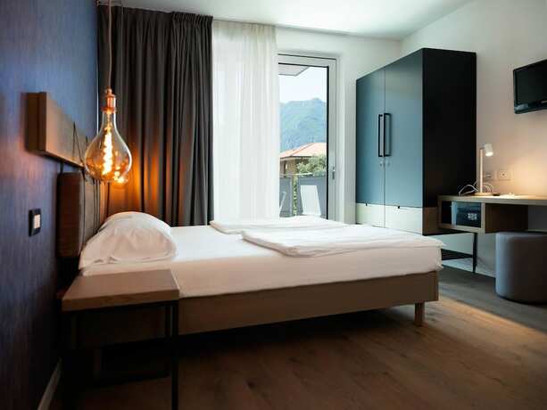 Imagen de la habitación del Glocal Torbole. Foto 15