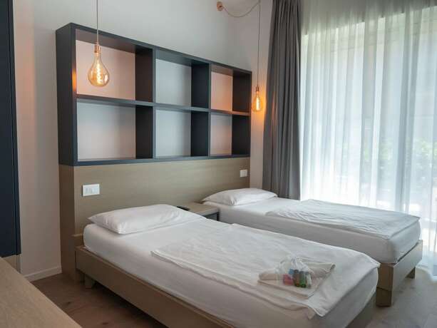 Imagen de la habitación del Glocal Torbole. Foto 17