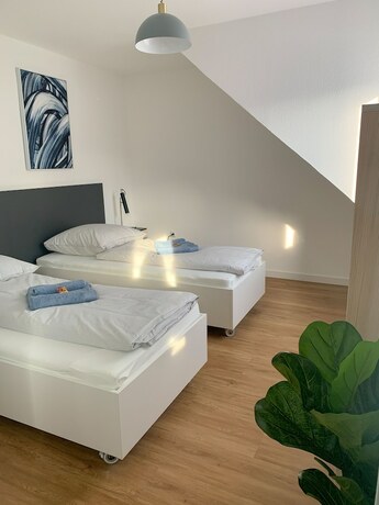 Imagen de la habitación del Gl&uuml;ck Auf Appartement L&ouml;sortstra&szlig;e. Foto 14