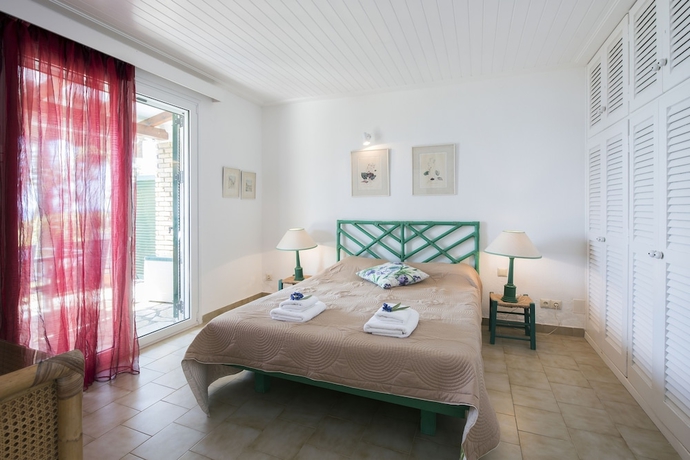 Imagen de la habitación del Glyfada Homes Resort. Foto 6