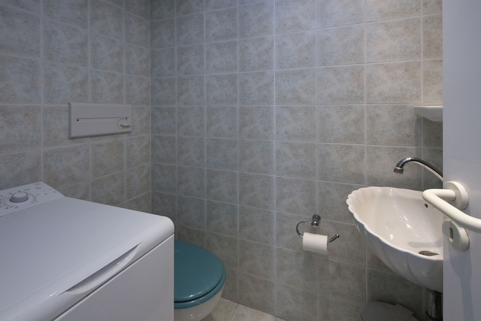 Imagen de la habitación del Glyfada Homes Resort. Foto 11