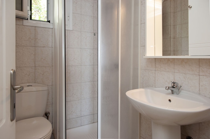 Imagen de la habitación del Glyfada Homes Resort. Foto 12