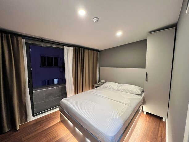 Imagen de la habitación del Gokotta Suite Hotel. Foto 13
