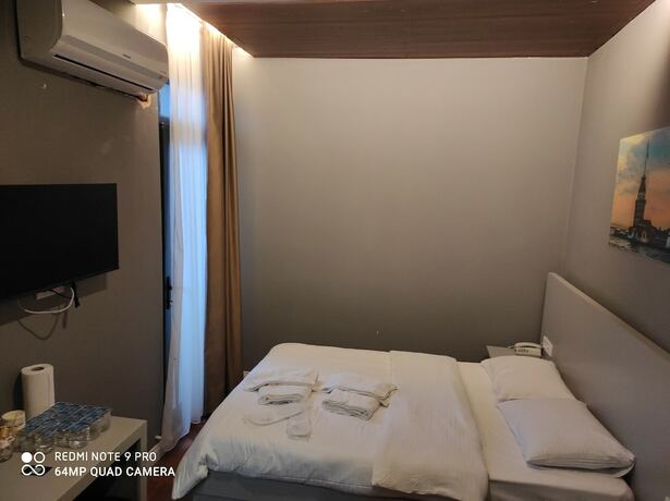 Imagen de la habitación del Gokotta Suite Hotel. Foto 15