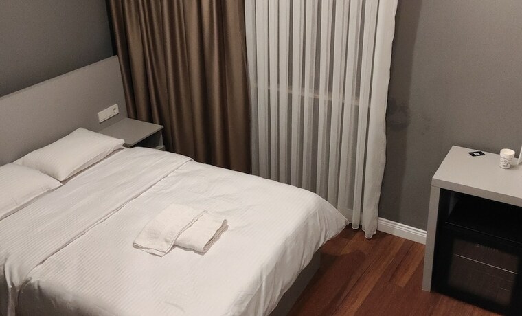 Imagen de la habitación del Gokotta Suite Hotel. Foto 16