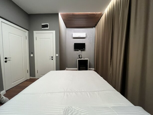 Imagen de la habitación del Gokotta Suite Hotel. Foto 17