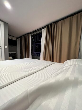 Imagen de la habitación del Gokotta Suite Hotel. Foto 18