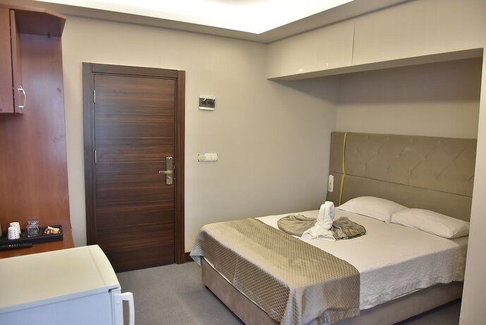 Imagen de la habitación del Gold City Hotel. Foto 15