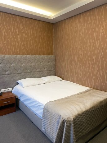 Imagen de la habitación del Gold City Hotel. Foto 18