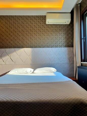 Imagen de la habitación del Gold City Hotel. Foto 19