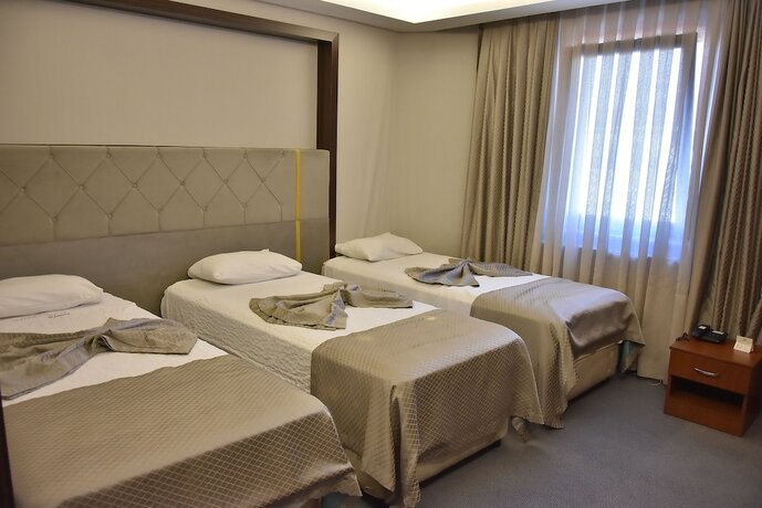 Imagen de la habitación del Gold City Hotel. Foto 20