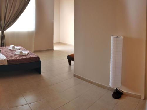 Imagen de la habitación del Golden Beach Hotel, Metamorfosi. Foto 7