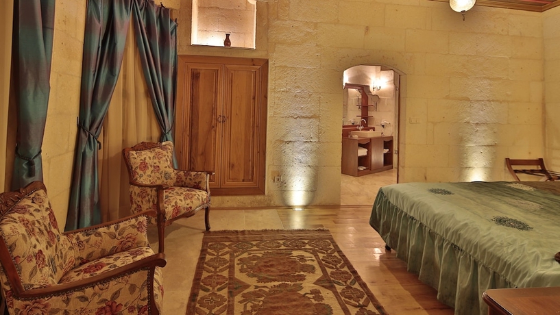 Imagen de la habitación del Golden Cave Suites. Foto 13