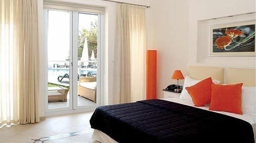 Imagen de la habitación del Golden Life Heights Deluxe Suite Hotel - Adults Only. Foto 4