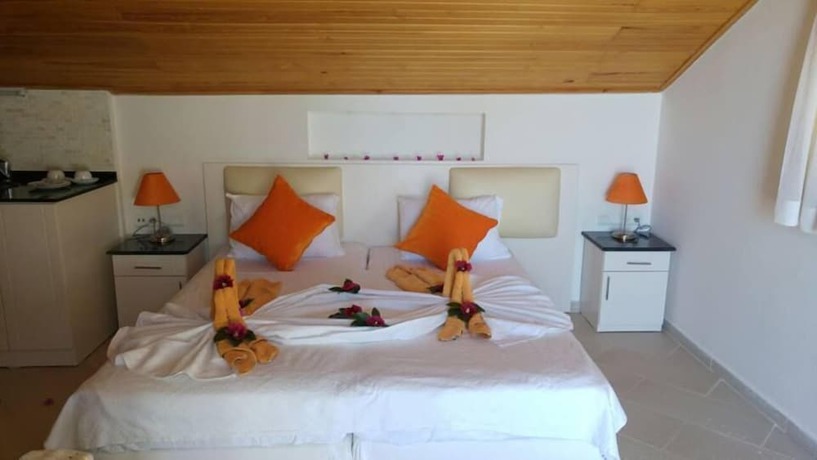 Imagen de la habitación del Golden Life Heights Deluxe Suite Hotel - Adults Only. Foto 6